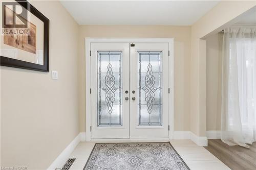 Doorway featuring french doors and baseboards - 273 Bryant Crescent, Burlington, ON - Indoor Photo Showing Other Room