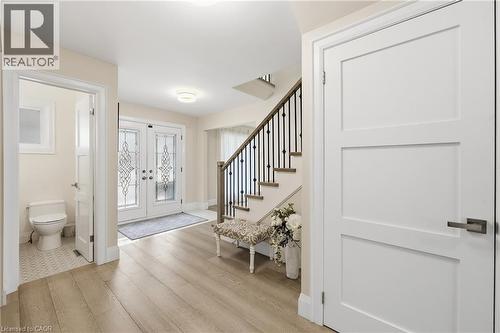 Entryway featuring light wood-type flooring and french doors - 273 Bryant Crescent, Burlington, ON - Indoor Photo Showing Other Room
