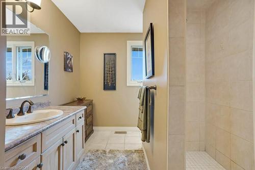 Bathroom with vanity, a shower stall, light tile patterned floors, and plenty of natural light - 5511 Second Line, Erin, ON - Indoor Photo Showing Bathroom