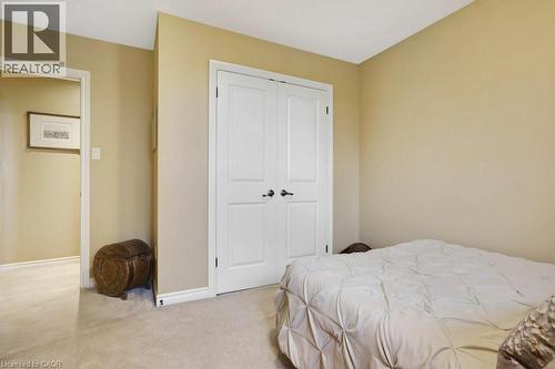 Bedroom with light carpet and a closet - 5511 Second Line, Erin, ON - Indoor Photo Showing Bedroom