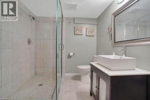 Full bath with vanity, a shower stall, and light tile patterned floors - 5511 Second Line, Erin, ON - Indoor Photo Showing Bathroom