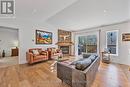 89 Trout Lane, Tiny, ON  - Indoor Photo Showing Living Room With Fireplace 