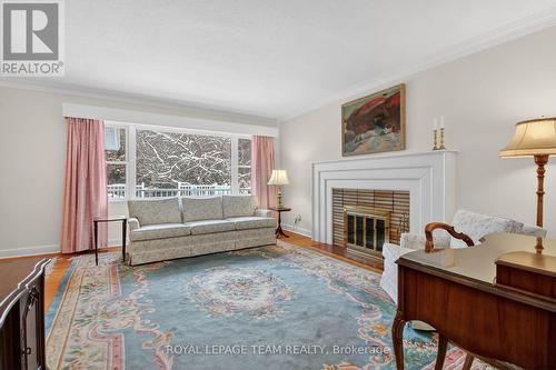 825 Killeen Avenue, Ottawa, ON - Indoor Photo Showing Living Room With Fireplace