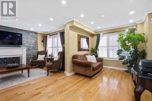 3358C Kingston Road, Toronto, ON - Indoor Photo Showing Living Room With Fireplace
