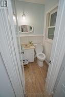 1/2 Bath off Kitchen - 