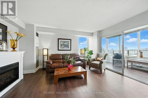 2002 - 215 Wynford Drive, Toronto, ON - Indoor Photo Showing Living Room With Fireplace