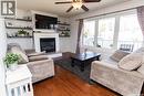 207 Brookdale Place, Wynyard, SK  - Indoor Photo Showing Living Room With Fireplace 