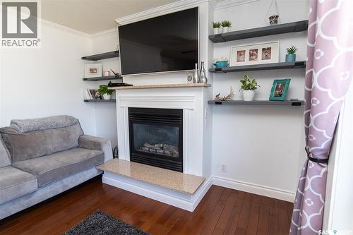 207 Brookdale Place, Wynyard, SK - Indoor Photo Showing Living Room With Fireplace