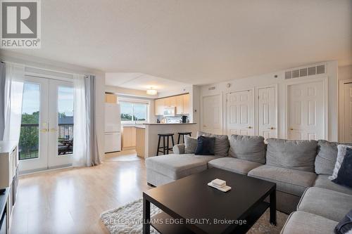 304 - 4450 Fairview Street, Burlington, ON - Indoor Photo Showing Living Room