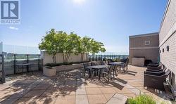 Enjoy common area rooftop BBQs all summer long! - 