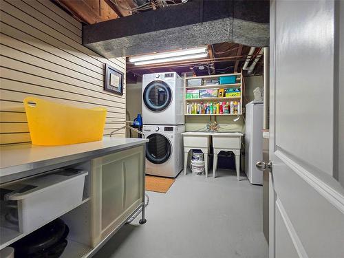 Laundry and storage - 701 Sherburn Street, Winnipeg, MB - Indoor Photo Showing Laundry Room