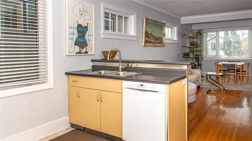 Kitchen looking towards Living Room/Dining Area - 701 Sherburn Street, Winnipeg, MB - Indoor Photo Showing Kitchen With Double Sink