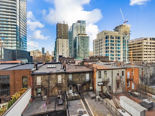 402-5 St Joseph Street, Toronto, ON - Outdoor With Facade