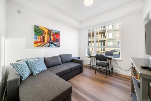 100-3564B Ryder Hesjedal Way, Colwood, BC - Indoor Photo Showing Living Room