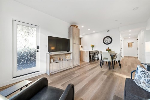 100-3564B Ryder Hesjedal Way, Colwood, BC - Indoor Photo Showing Living Room