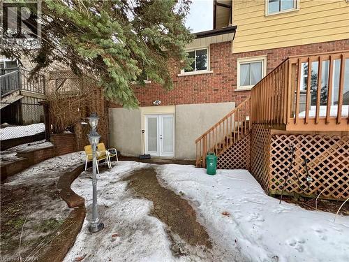 Back of house featuring stairway, brick siding, a patio, and a deck - 86 Devonglen Drive, Kitchener, ON - Outdoor With Deck Patio Veranda With Exterior