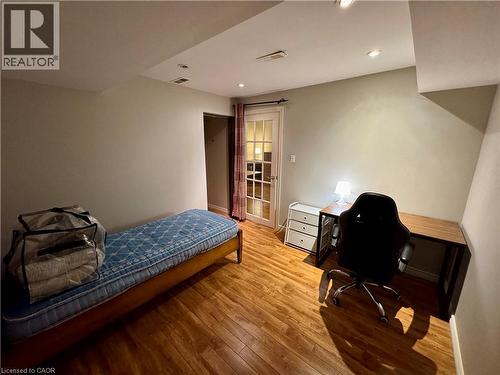 Bedroom with an office area, light wood-style flooring, and recessed lighting - 86 Devonglen Drive, Kitchener, ON - Indoor Photo Showing Bedroom