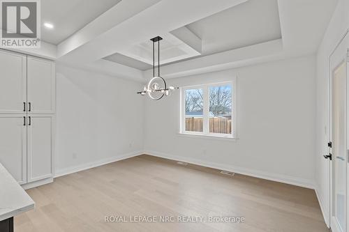 Dining area w/ tray ceiling & view of backyard! - 4705 Lee Avenue, Niagara Falls (Ascot), ON - Indoor Photo Showing Other Room