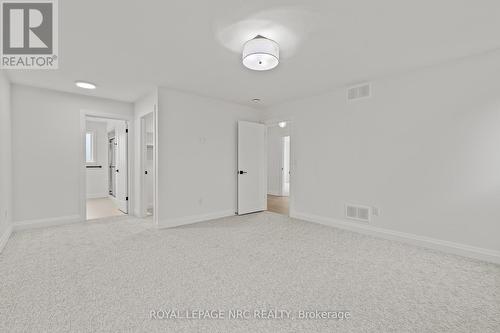 King size Primary Suite. - 4705 Lee Avenue, Niagara Falls (Ascot), ON - Indoor Photo Showing Other Room