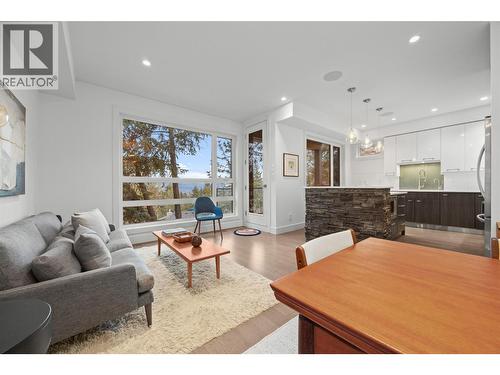 living area- w. TV lift closed. - 1818 Peak Point Court Unit# 3, West Kelowna, BC - Indoor Photo Showing Living Room