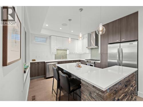 Open concept kitchen with island seating - 1818 Peak Point Court Unit# 3, West Kelowna, BC - Indoor Photo Showing Kitchen With Upgraded Kitchen