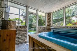 ...which leads to the pool and patio area. - 