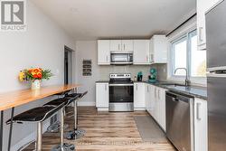 Kitchen - Granite Tops, Laminate Floors - 