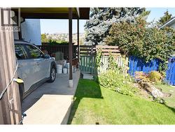 Gate leading to back yard from carport - 