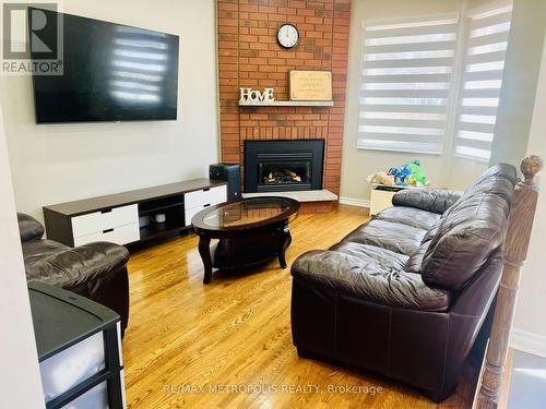 2 Sable Crescent, Whitby, ON - Indoor Photo Showing Living Room With Fireplace
