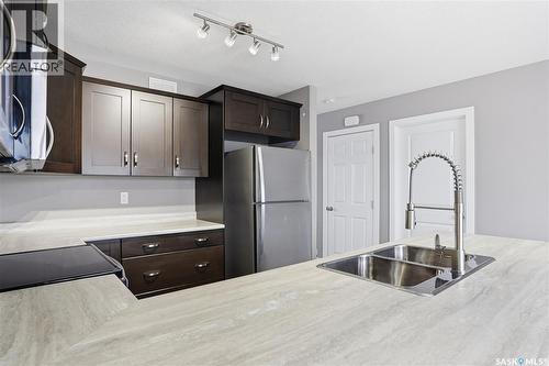 242 Kloppenburg Way, Saskatoon, SK - Indoor Photo Showing Kitchen With Double Sink
