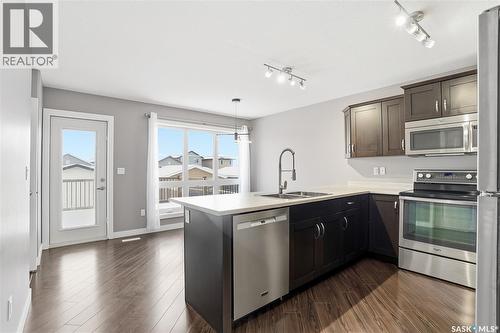 242 Kloppenburg Way, Saskatoon, SK - Indoor Photo Showing Kitchen With Double Sink