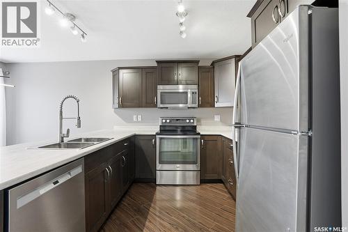 242 Kloppenburg Way, Saskatoon, SK - Indoor Photo Showing Kitchen With Double Sink