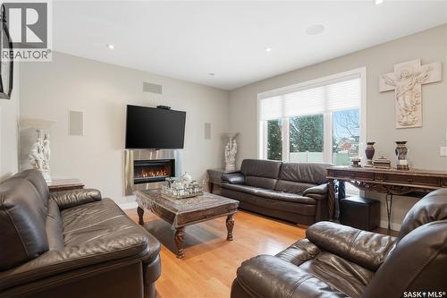 215 Beechwood Crescent, Saskatoon, SK - Indoor Photo Showing Living Room With Fireplace