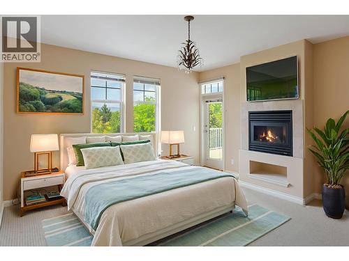 *This photo has been virtually staged. - 371 Mccarren Avenue, Kelowna, BC - Indoor Photo Showing Bedroom