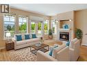 *This photo has been virtually staged. - 371 Mccarren Avenue, Kelowna, BC  - Indoor Photo Showing Living Room With Fireplace 