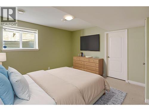 *This photo has been virtually staged. - 371 Mccarren Avenue, Kelowna, BC - Indoor Photo Showing Bedroom