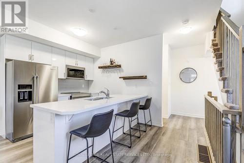 14 - 305 Garner Road W, Hamilton, ON - Indoor Photo Showing Kitchen With Stainless Steel Kitchen With Double Sink With Upgraded Kitchen