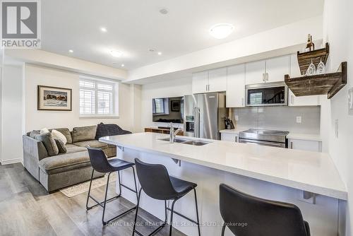 14 - 305 Garner Road W, Hamilton, ON - Indoor Photo Showing Kitchen With Double Sink