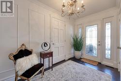 Elegant Foyer offers access to garage and yard - 