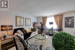 Generous living room with gas fireplace - 