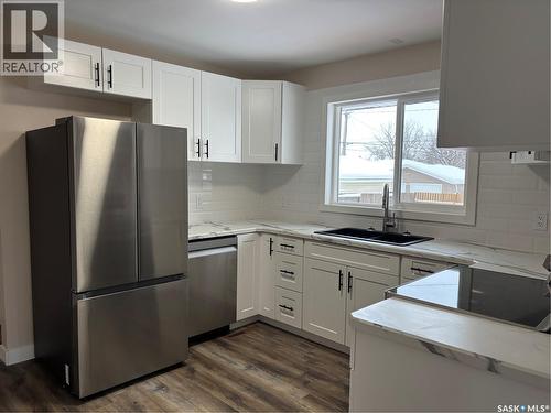 353 25Th Street W, Prince Albert, SK - Indoor Photo Showing Kitchen With Double Sink With Upgraded Kitchen