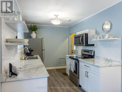 1064 Sovereign Road, Woodstock (Woodstock - North), ON - Indoor Photo Showing Kitchen With Double Sink