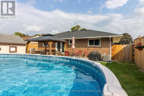 1064 Sovereign Road, Woodstock (Woodstock - North), ON - Outdoor With Above Ground Pool