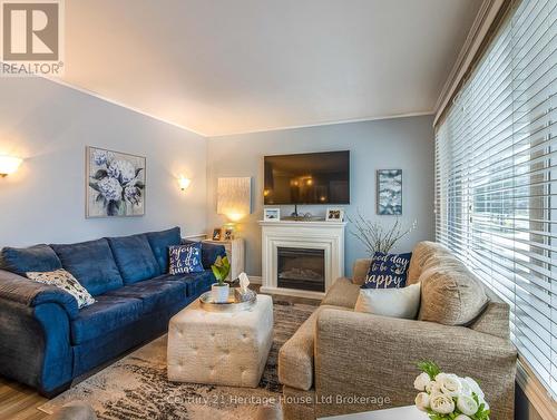 1064 Sovereign Road, Woodstock (Woodstock - North), ON - Indoor Photo Showing Living Room With Fireplace