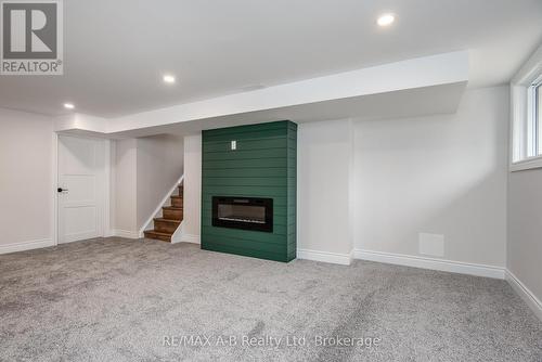 149 Norfolk Street, Stratford, ON - Indoor With Fireplace