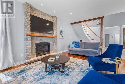 34 Hills Road, Kawartha Lakes (Bobcaygeon), ON - Indoor Photo Showing Living Room With Fireplace