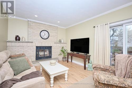28 Dixon Crescent, Welland (N. Welland), ON - Indoor Photo Showing Living Room With Fireplace
