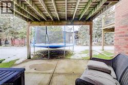 View of patio featuring a trampoline - 