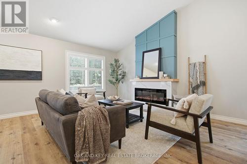 2 - 4067 Colonel Talbot Road, London South (South V), ON - Indoor Photo Showing Living Room With Fireplace
