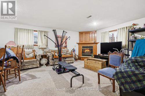 3 Borden Avenue, Port Colborne (Main Street), ON - Indoor Photo Showing Living Room With Fireplace